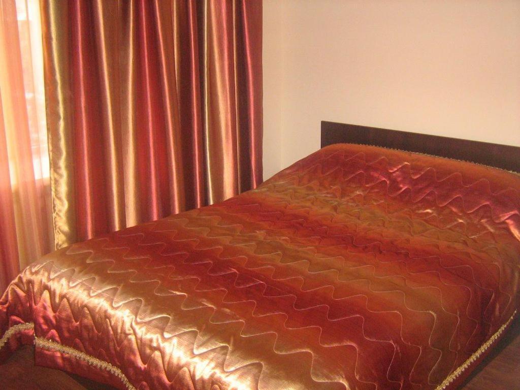 Kausar Hotel Almaty Quarto foto