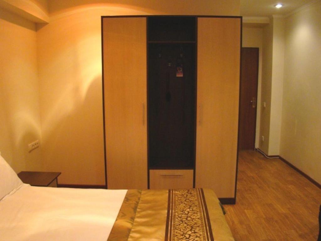 Kausar Hotel Almaty Quarto foto