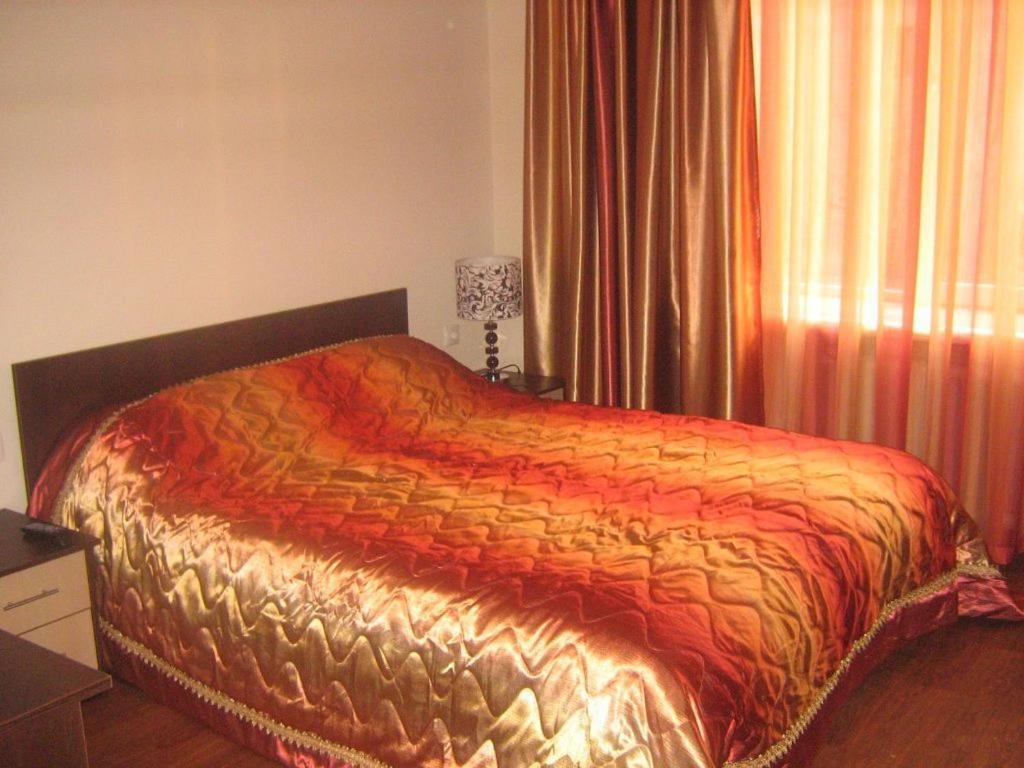 Kausar Hotel Almaty Quarto foto