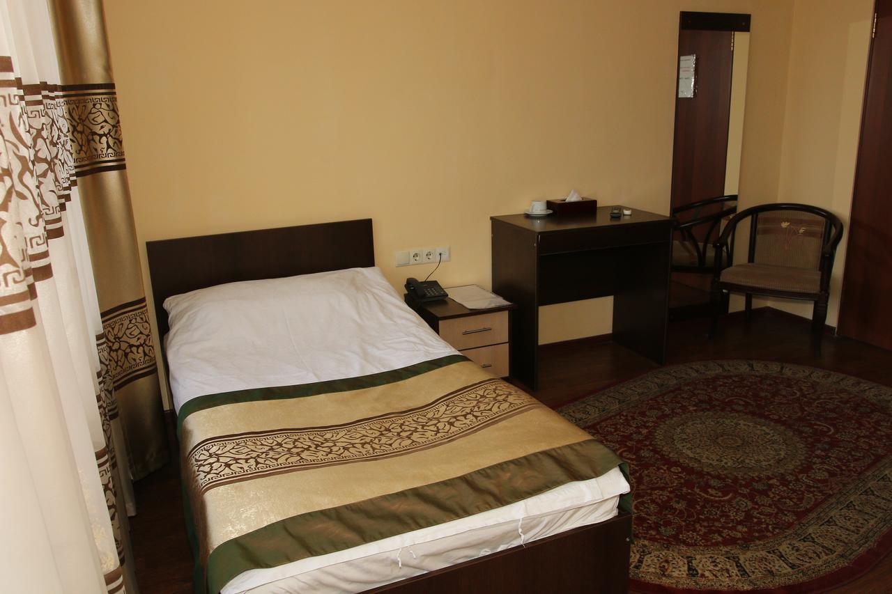 Kausar Hotel Almaty Quarto foto